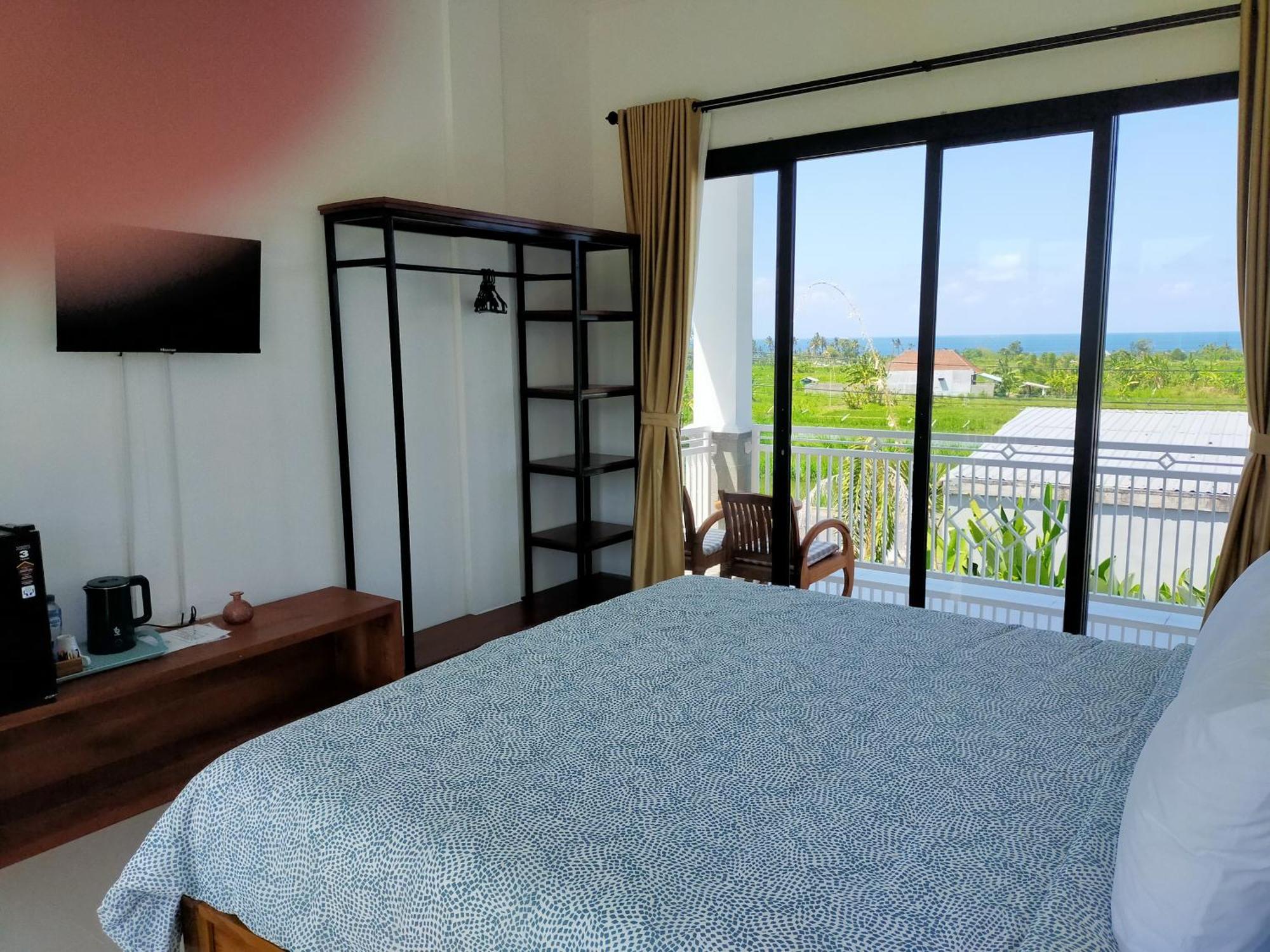 Limun Guesthouse Amlapura Phòng bức ảnh